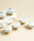 Set Of 6 Real Deal White Marble Cabinet Knobs With Top Shelf Brass Drawer Pulls For Kitchen Drawers And Bathroom Vanities. Six round knobs displayed on a neutral background.