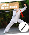 Man practicing martial arts with sword, inset of Protective Black Cotton Cloth Japanese Carrying Bag For Safe Transport And Display.