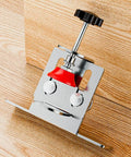 Close-up of Effortless Cabinet Door Installation Tool Kit with adjustable clamp and positioner on wooden surface