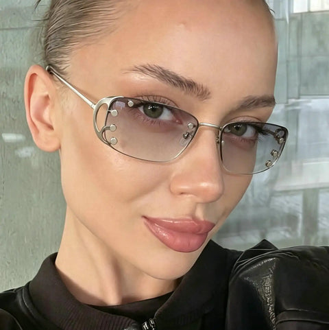 Totally Chic Rimless Women Sunglasses With Dope Silver Metal Frames Featuring Clean Lightweight Rectangle Shades That Bring Major Summer Vibes To Any Fit, close-up view on model.