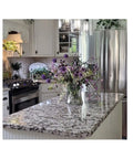 Gray White Black Granite Marble Look Vinyl Countertop Wrap Peel And Stick Waterproof Scratch And Heat Resistant Roll in a kitchen setting.
