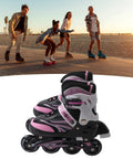 Pink Adjustable Kids Roller Blades For Girls And Boys, Size M, Breathable PU Mesh, skating by the beach at sunset.