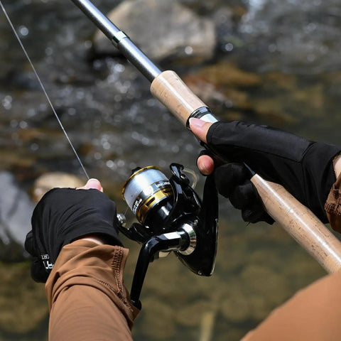 Angler using Telescopic Carbon Fiber Fishing Pole Combo Kit With Reel 6.9 Ft Travel Rod Set by a river