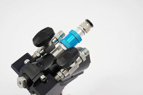 Close-up view of the Heavy Duty Polyurethane Foam Spray Gun With Air Purge Self Cleaning Pu Foaming Tool Cast Iron Frame.