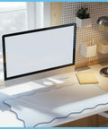 Scalloped Desk Pad With Edge Stitching Large Nonslip Waterproof Table Mat Blue 31.5 x 15.8 Inches on a modern desk