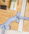 Heavy Duty Stainless Steel Pipe Clamp Fixture With 90 Degree Corner Squares Adjustable Magnetic Alignment Tool in use on wood