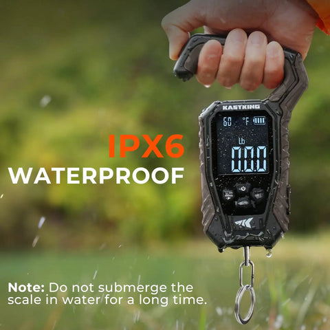 WeighMaster Mechanical Digital Fishing Scale With Lip Gripper 120 Lb Capacity shown held in hand, displaying IPX6 waterproof feature.