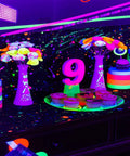 50W Black Light Flood Light With Plug And Switch For Glow Parties illuminating neon decorations and cupcakes