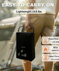 Person holding a lightweight 8.8 lbs propane portable instant water heater with digital display for camping use.