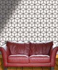 Elevate Your Home Digs With This Thick Textured Vinyl Wallpaper Roll light color peel and stick removable wall covering behind a red sofa.