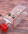 RC Fuel Tank For Airplanes 300ml transparent plastic with CNC machined metal cap, leak proof on wooden surface view
