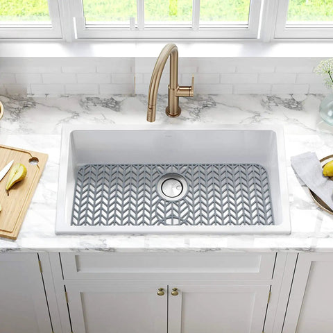 Gray 29 By 15.35 Inch Silicone Kitchen Sink Mat in stainless steel sink, prevents scratches and dish breakage.