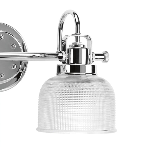 Close-up of a Two Light Coastal Bath Vanity Light with Clear Double Prismatic Glass Shade in Polished Chrome Finish for bathrooms