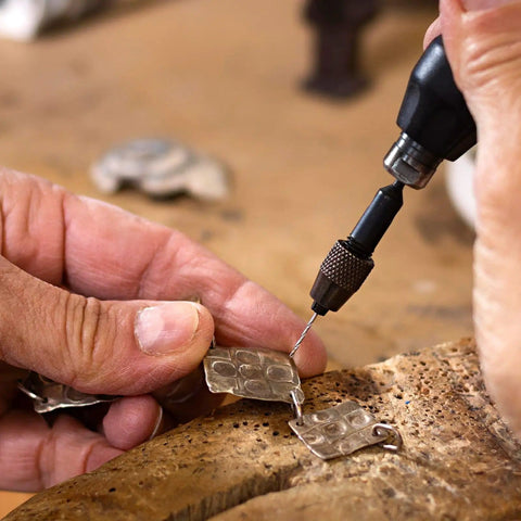Using 40 Pc Mini Drill Bit Set 0.3Mm To 1.6Mm High Speed Steel HSS to craft jewelry with precision rotary hand tool.