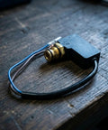 Premium Pressure Washer Switch Assembly Replacement With Pre-Stripped Wires And Durable Brass Threaded Connector In Compact Rectangular Housing on wooden surface.