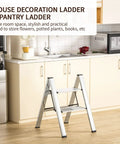 Two Step Folding Ladder With Anti Slip Wide Pedals in kitchen setting near cabinets and appliances