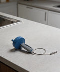 Heavy Duty Drain Cleaner Spring Coil Strip Multi Length Plumbing Snaker Flexible Pipe Breaker For Sink And Tub on countertop.