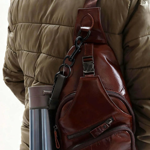 Built Tough Swivel Bolt Snap Hooks With D Ring Ends Rock Solid Lobster Claw Trigger Clips For Handbags Purses Knitting And Leatherwork Matte Black Pack Of 10 attached to a brown leather bag.
