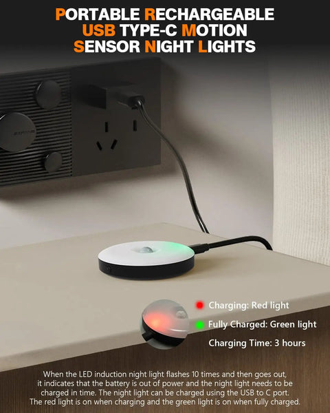 Rechargeable Magnetic Puck Lights With Motion Sensor charging via USB-C, showing red light for charging status and green for full charge.