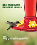 Set Of 2 10 Ounce Hummingbird Feeders With Built In Ant Guard, Wide Mouth For Easy Filling, Circular Perch With Multiple Feeding Ports, Outdoor Plastic Design For Easy Cleaning And Backyard Nectar Viewing, close-up of red feeder with hummingbird feeding.