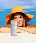 Laser Leopard Skinny Can Cooler Made With Double Wall Vacuum Insulated Stainless Steel To Keep Your Twelve Ounce Tall Boys Frosty All Night Long in a sunny poolside setting.