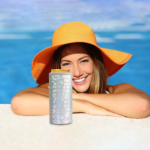 Laser Leopard Skinny Can Cooler Made With Double Wall Vacuum Insulated Stainless Steel To Keep Your Twelve Ounce Tall Boys Frosty All Night Long in a sunny poolside setting.