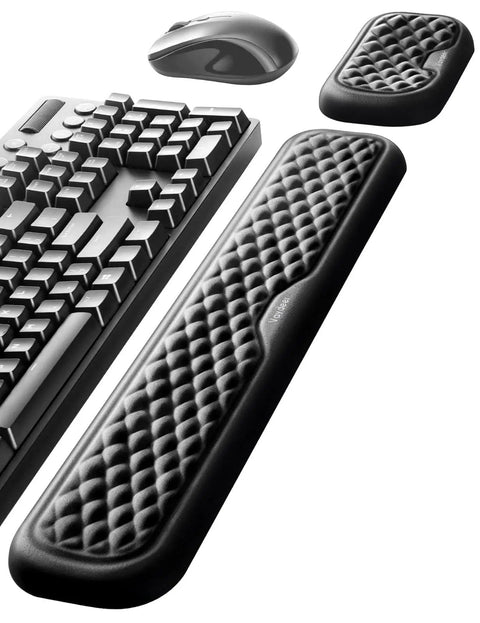 Ergonomic Wrist Rest For Keyboard And Mouse, Memory Foam Arm Cushion With Soft Lycra Cover next to keyboard and mouse.