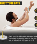 Man in bath demonstrating Freestanding Tub Drain Rough In Kit With 12 Inch Flange Base No Fuss Easy Install For Free Standing Tubs ABS And Brass Pipe CUPC Certified Quick Leak Free Drain System That Fits Most Freestanding Bathtubs