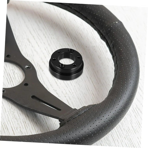 Close-up of Racing Car Riser Adapter Plate Auto Accessory For Enhanced Comfort And Precise Control with steering wheel