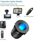 Image of a 12V cigarette lighter socket for Tent Style Power Panel With 12V USB Outlet And Lighted Cigarette Lighter Socket PD3.0 And QC3.0 Car USB Port Aluminum Charger LED Voltmeter And Switch Waterproof DIY Kit For Car Boat Marine And RV Road Ready, shown with car accessories.