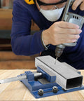 Worker using Drill Press Vise For Real World Makers, 4 Inch Jaw Opening Machinist Vise, Boss Tough Heavy Duty Steel Low Profile Bench Clamp For Drilling, Milling, Woodworking, Modeling, DIY Projects, Portable And Durable on metal workpiece
