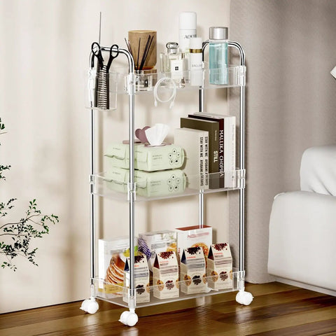 Clear 3 Tier Acrylic Rolling Storage Cart With Four Extension Poles For Tall Items And Bottles Laundry Room Bathroom Office Or Living Room Organization Mobile Multifunction Shelving Unit with items displayed.