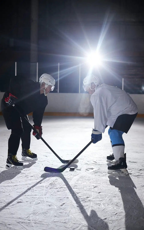 Hockey players on ice rink illuminated by Hella Bright Outdoor LED Stadium Light 300W 42000 Lm 6500K IP67 Waterproof