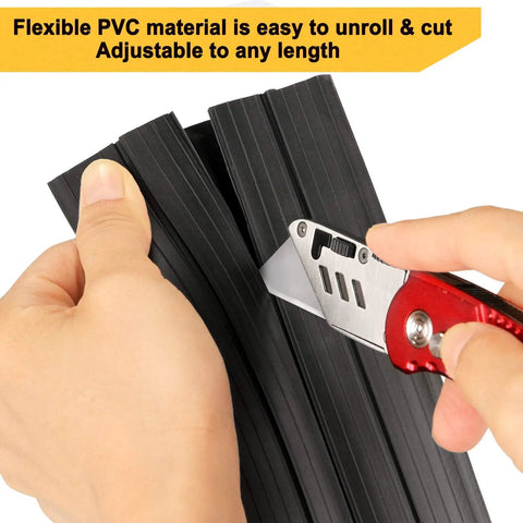 Hands cutting 10ft Floor Cord Cover For Home Or Office With 3 Cord Channels Quick Install Cable Protector, black PVC material