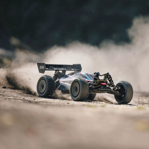 ARRMA Typhon 1 Eight Scale RC Buggy Ready To Race 6S 4WD BLX RTR racing on dirt with TLR Tuned parts and race spec red blue body