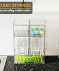 Multi Size Baby Bottle Storage Rack With Stackable Acrylic Drawers Keeps Your Counter Tight And Clutter Free Total Game Changer For Nursery Vanities Or Kitchen Cabinet Snag This Easy Access Five Pack Set. Clear acrylic unit holding baby bottles and stoppers on a black countertop.