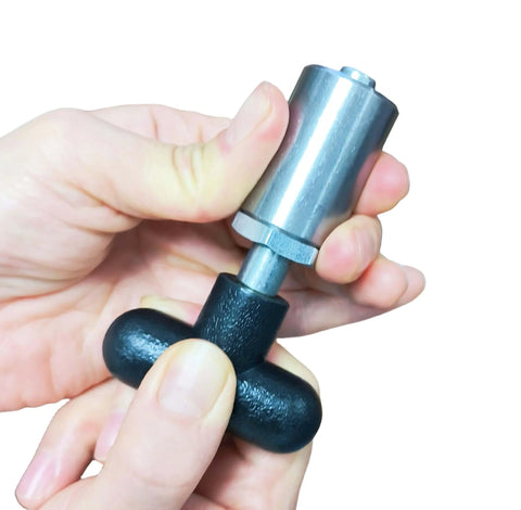 Beefy Three-Eighths Inch Spring-Loaded Pull Pin With T-Handle held in hand showing steel plunger dowel pin, ergonomic grip handle.