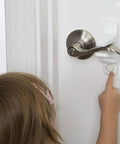 Outsmart Lever Handle Lock 2 Pack White Easy Install Kidproof Door Safety for Lever Handles, Fits Most Levers, door lock in use
