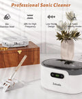 600ml Ultrasonic Jewelry Cleaner With Digital Timer for Glasses Rings Silver Coins and Makeup Brushes on a table