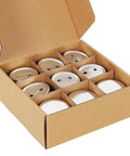 Front view of a cardboard box containing nine 58mm button blanks with pin backs in a 3x3 grid (beige/white)