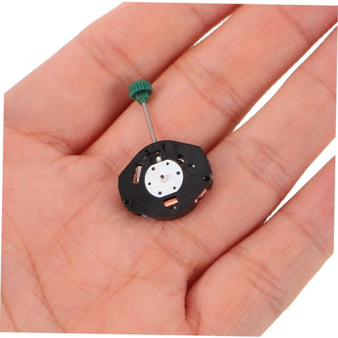 Close-up of Quartz Movement Replacement Kit 6 Pcs For DIY Watch Repair in hand showing compact, travel-friendly design.
