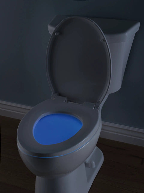 Sanborne Elongated Potty Training Toilet Seat With Nightlight Glow Slow Close And Quick Release Dual Adult And Child Design Kid Friendly No Hassle Install White Durable Plastic Perfect For Family Bathrooms with glowing blue nightlight shown on toilet.