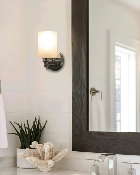 Kira Home Phoebe 8" Modern Industrial Wall Sconce for Bathroom Vanity, Pack of 2, chrome finish with frosted glass shade.