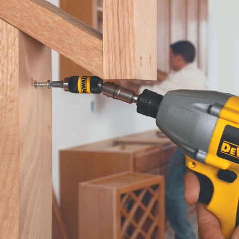 Pivoting Impact Driver Bit Tip Holder With Ring, One Quarter Inch Shank Fits Any Chuck Or Impact Driver, Delivers Up To Two Thousand Inch Pounds Of Torque For Tightening Loosening And Drilling, Durable Steel Construction in use on a wooden cabinet