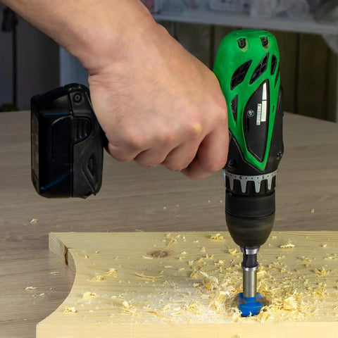 Person using drill with Three Piece Collet Adapter Set With 6mm 8mm And 6.35mm Sizes Carbon Steel Router Collet Reducers on wood