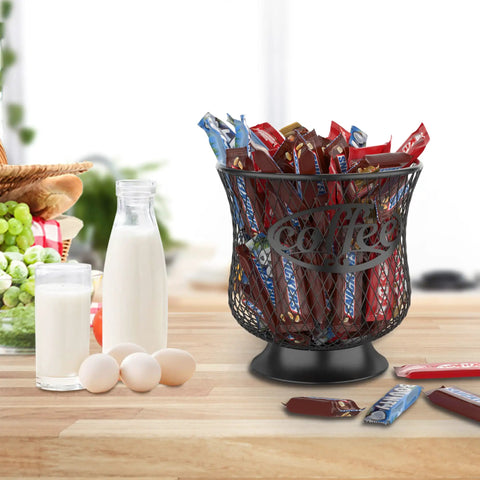 Barista Approved Large Capacity Coffee Pod Holder with candy bars, mesh design, on a wooden kitchen countertop with milk and eggs.