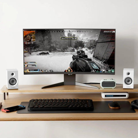 Powered Bookshelf Speakers For Desktop And Gaming With Bluetooth 5.3 And 24 Bit USB DAC, positioned beside a monitor