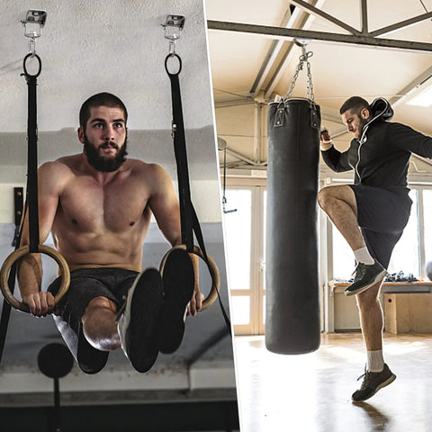 Man using Beefy Heavy Duty Swing Hangers for Wooden Sets 360 Swivel Stainless Steel Hardware 1000 Pound Capacity in gym setting