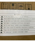 Multi-language safety warning on cardboard box with symbols indicating handling instructions.