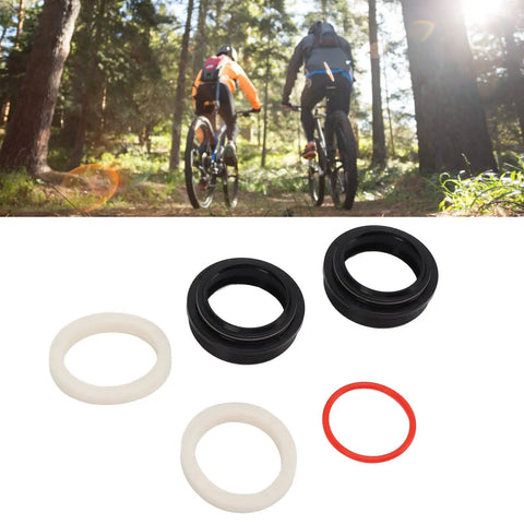 32mm Front Fork Dust Wiper Kit for Suspension Forks, featuring rubber seals, foam rings, and o rings, with cyclists in forest background.